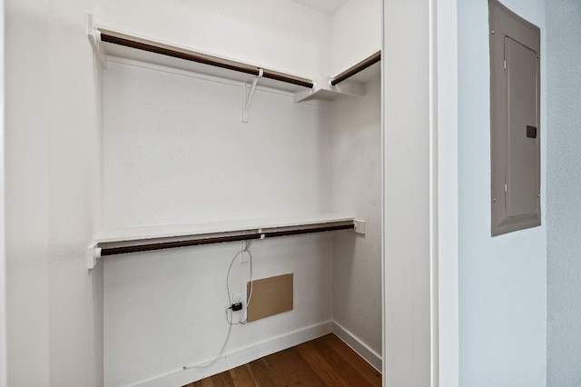 2002 E 7th St Unit 204, Austin, TX 78702 - walk in closet featuring electric panel and dark wood-type flooring