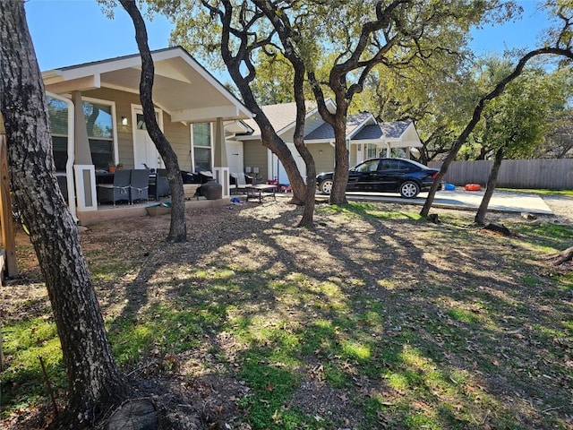 view of yard featuring fence