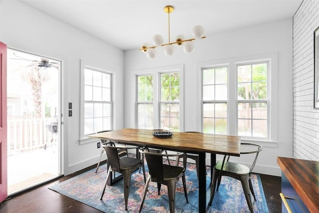 1508 E 11th St, Austin, TX 78702 - dining space with plenty of natural light, a chandelier, and dark wood-type flooring