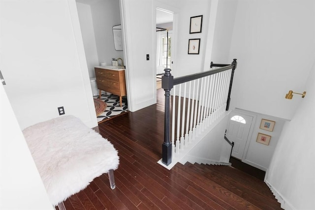 1508 E 11th St, Austin, TX 78702 - stairway featuring hardwood / wood-style flooring and baseboards
