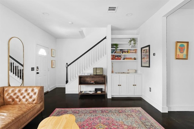 1508 E 11th St, Austin, TX 78702 - living room featuring stairs and wood finished floors