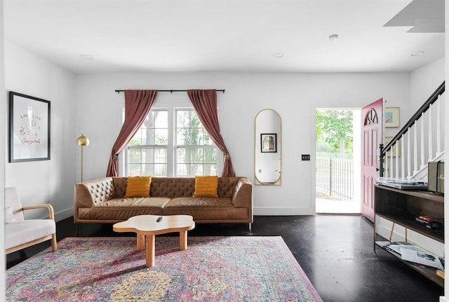 1508 E 11th St, Austin, TX 78702 - living room with healthy amount of natural light, stairs, recessed lighting, and concrete floors