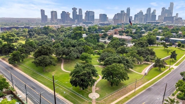 1508 E 11th St, Austin, TX 78702 - aerial overview of property's location featuring skyline and a tree filled landscape