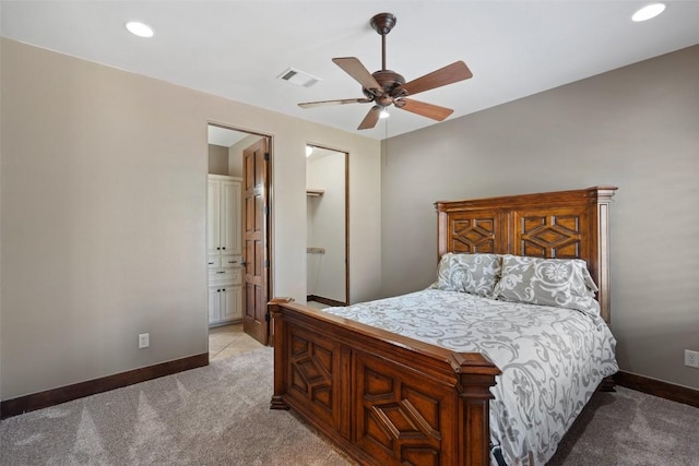 bedroom featuring visible vents, baseboards, recessed lighting, and light carpet
