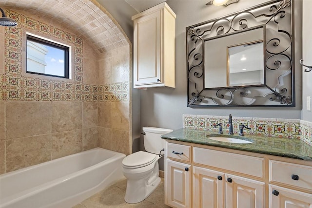 bathroom with vanity, toilet, and shower / washtub combination