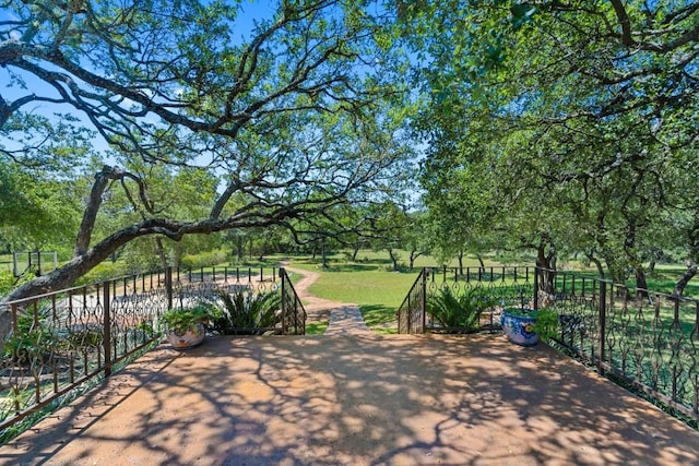 view of patio featuring fence