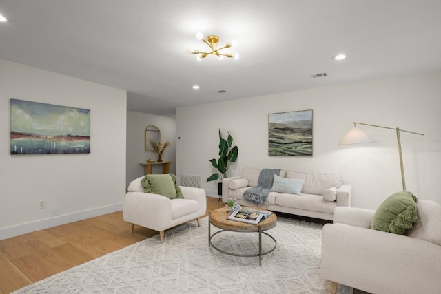 1907 Casa Grande Dr, Austin, TX 78733 - living area featuring wood finished floors, recessed lighting, and a chandelier