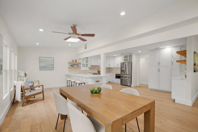 1907 Casa Grande Dr, Austin, TX 78733 - dining room with a ceiling fan, light wood-type flooring, and recessed lighting