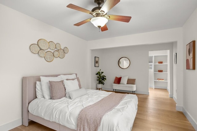 1907 Casa Grande Dr, Austin, TX 78733 - bedroom with light wood-type flooring and a ceiling fan