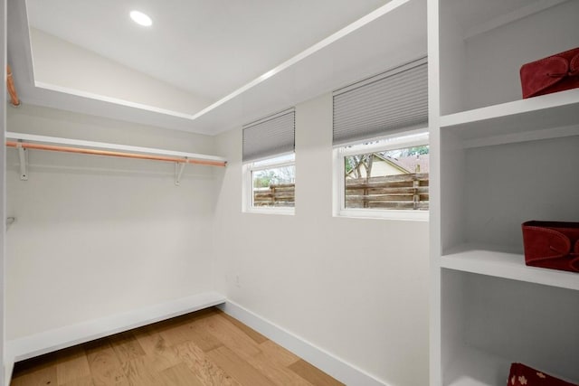 1907 Casa Grande Dr, Austin, TX 78733 - walk in closet with wood finished floors