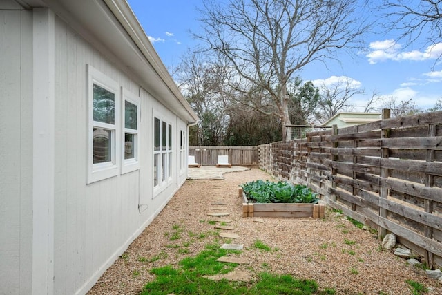 1907 Casa Grande Dr, Austin, TX 78733 - fenced backyard with a garden