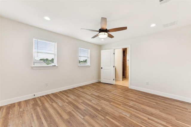 112 Callie St, Smithville, TX 78957 - unfurnished room featuring recessed lighting, visible vents, light wood finished floors, and baseboards