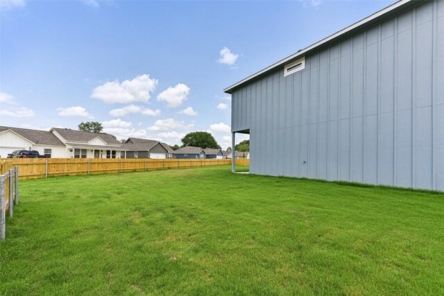 112 Callie St, Smithville, TX 78957 - view of yard featuring a residential view and fence