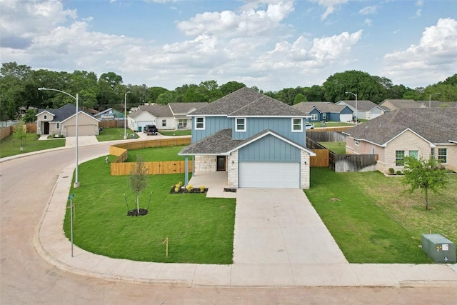 112 Callie St, Smithville, TX 78957 - traditional home featuring driveway, board and batten siding, fence, a front yard, and a residential view