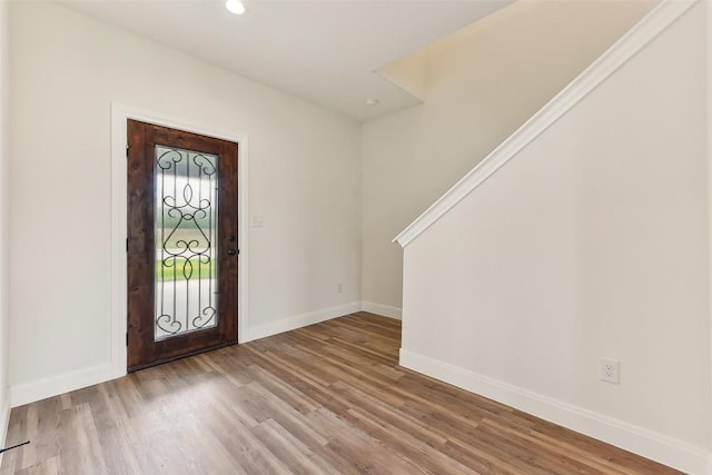 112 Callie St, Smithville, TX 78957 - entrance foyer featuring baseboards, wood finished floors, and recessed lighting