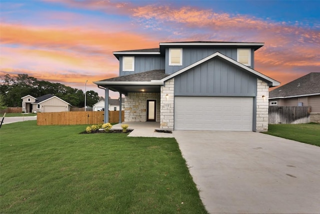 112 Callie St, Smithville, TX 78957 - view of front facade with a lawn, driveway, stone siding, fence, and a porch