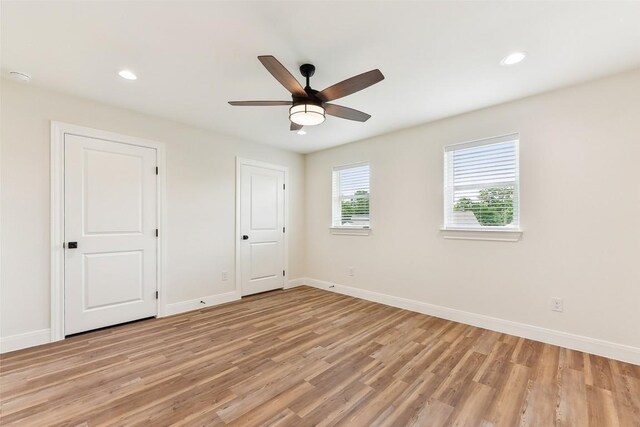 112 Callie St, Smithville, TX 78957 - unfurnished room with baseboards, light wood-style floors, and recessed lighting