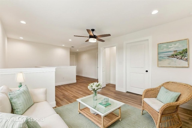 112 Callie St, Smithville, TX 78957 - living area featuring ceiling fan, baseboards, light wood-style floors, and recessed lighting