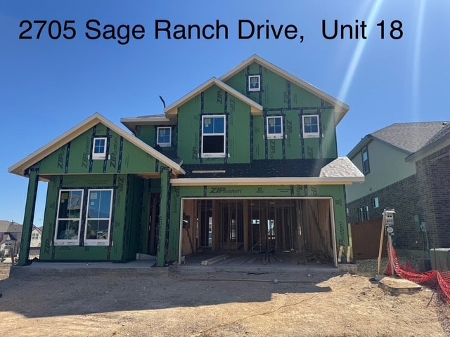 view of front of property with an attached garage