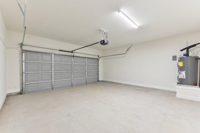 garage with baseboards, water heater, and a garage door opener