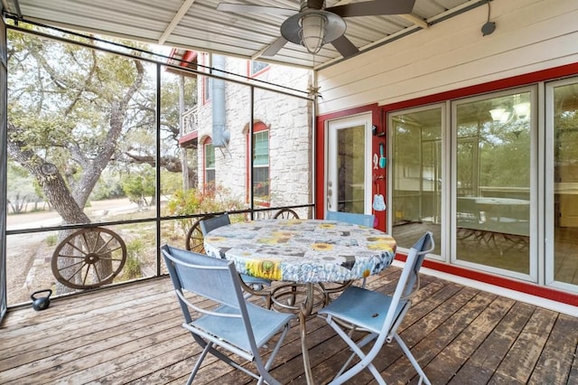 sunroom / solarium with ceiling fan