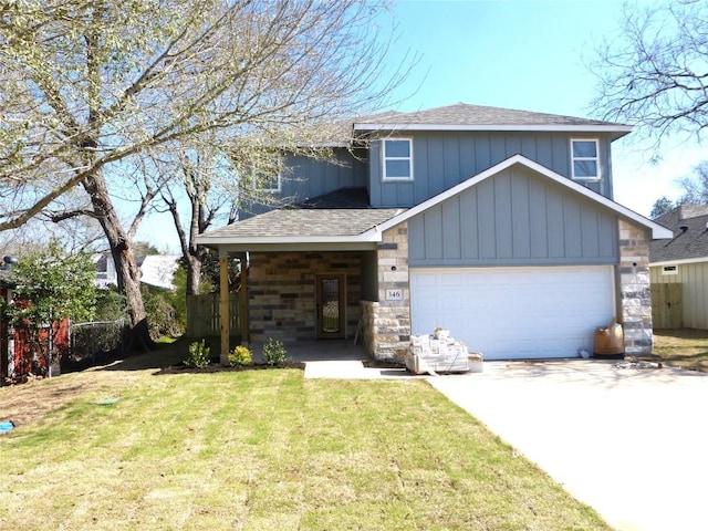 view of front of home with a garage and a front yard