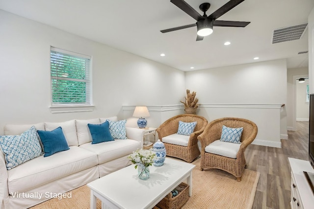 346 Webb St, Smithville, TX 78957 - living area featuring recessed lighting, wood finished floors, visible vents, and a ceiling fan