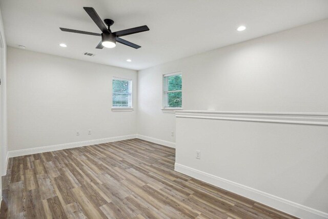346 Webb St, Smithville, TX 78957 - spare room with baseboards, visible vents, recessed lighting, wood finished floors, and ceiling fan