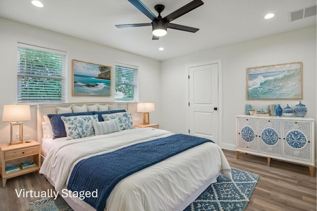 346 Webb St, Smithville, TX 78957 - bedroom with wood finished floors, visible vents, recessed lighting, and ceiling fan