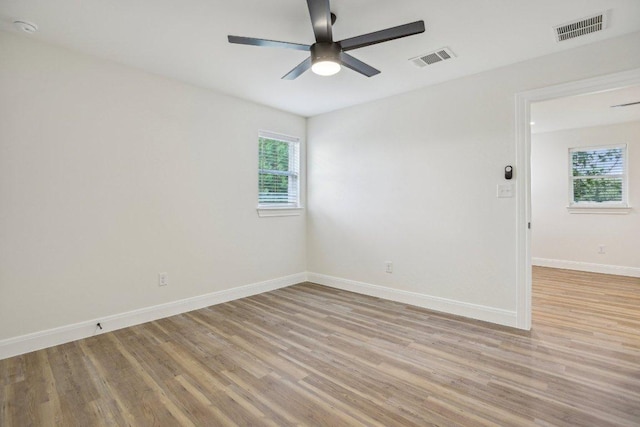 346 Webb St, Smithville, TX 78957 - empty room featuring ceiling fan, baseboards, visible vents, and light wood-style flooring