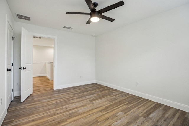 346 Webb St, Smithville, TX 78957 - unfurnished bedroom with wood finished floors, visible vents, and baseboards