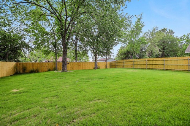 346 Webb St, Smithville, TX 78957 - view of yard with a fenced backyard
