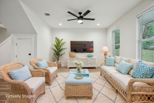 346 Webb St, Smithville, TX 78957 - living room with wood finished floors, a ceiling fan, visible vents, and recessed lighting
