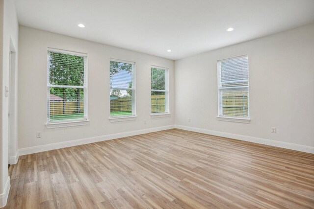 346 Webb St, Smithville, TX 78957 - unfurnished room with baseboards, light wood finished floors, and recessed lighting