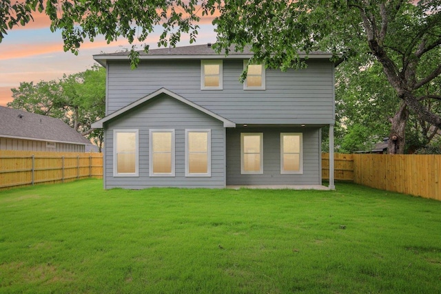 346 Webb St, Smithville, TX 78957 - rear view of property with a fenced backyard and a lawn