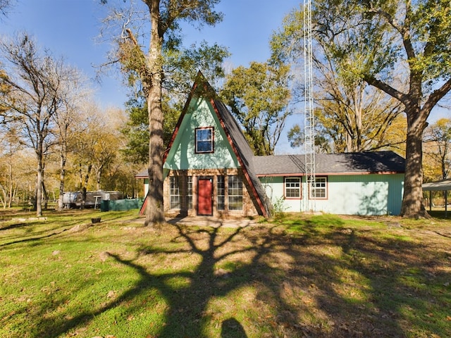 view of front of home with a front yard