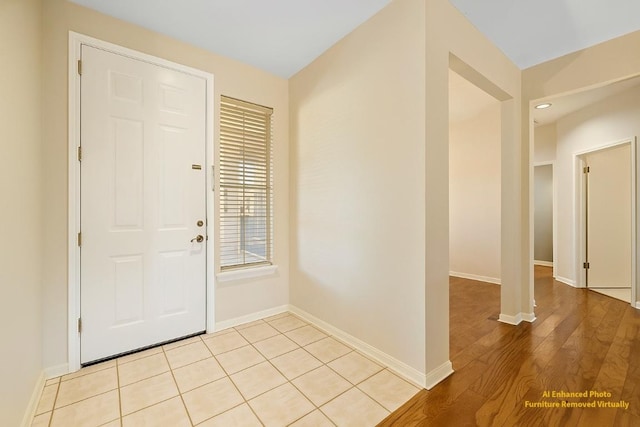 216 Whispering Wind Dr, Georgetown, TX 78633 - entryway featuring baseboards and light wood finished floors