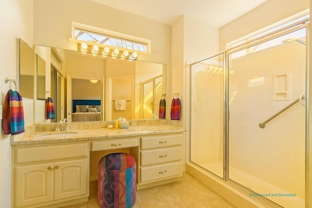 216 Whispering Wind Dr, Georgetown, TX 78633 - bathroom with ensuite bathroom, tile patterned floors, a shower stall, and vanity