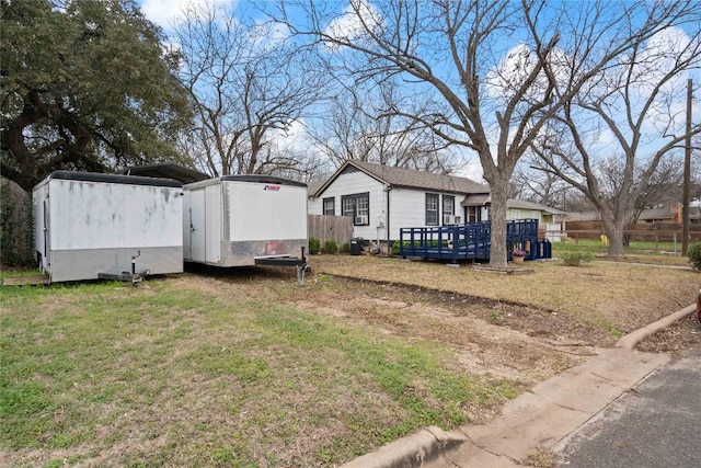 view of yard featuring a deck