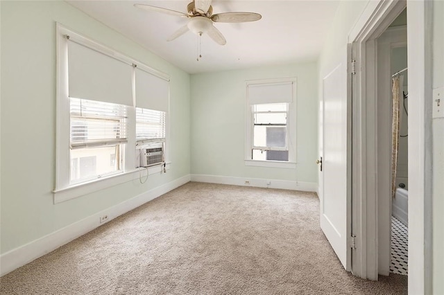 carpeted empty room with cooling unit and ceiling fan