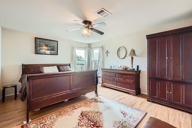 bedroom featuring ceiling fan and light wood-type flooring