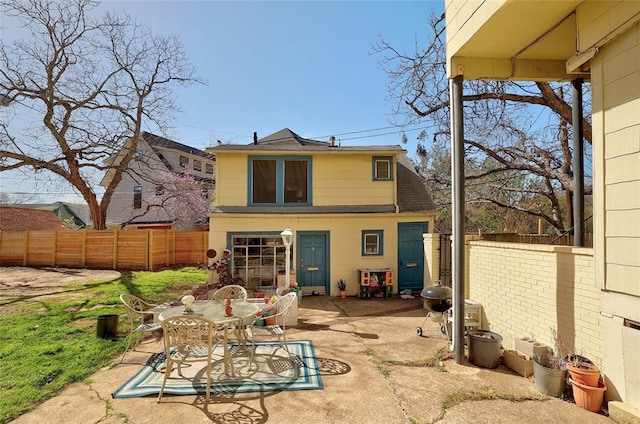 back of house featuring a patio