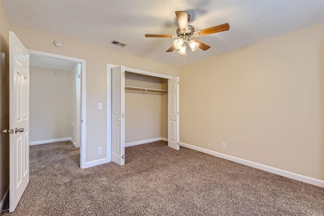 unfurnished bedroom featuring carpet floors, a closet, visible vents, and baseboards