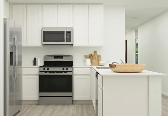 kitchen with white cabinetry, kitchen peninsula, stainless steel appliances, and light hardwood / wood-style floors