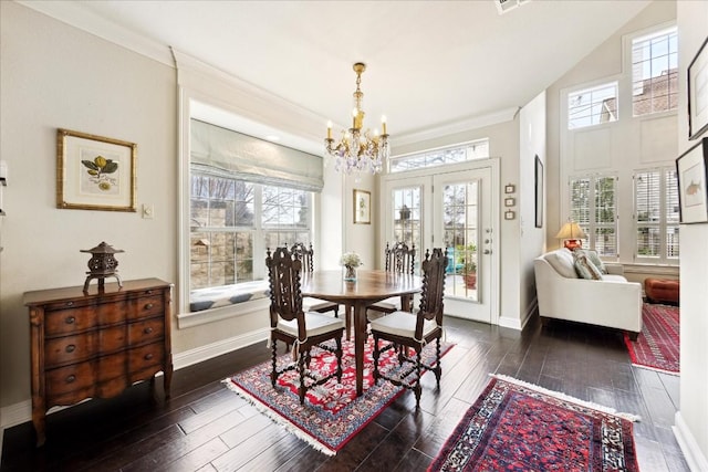 3800 Bailey Ln Unit F-1, Austin, TX 78756 - dining area featuring dark hardwood / wood-style flooring, crown molding, an inviting chandelier, and french doors