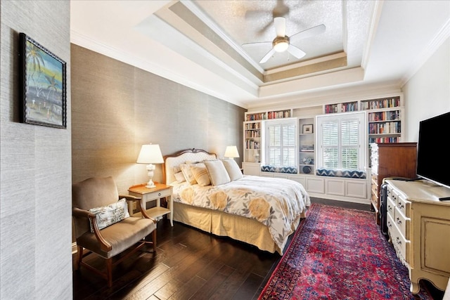 3800 Bailey Ln Unit F-1, Austin, TX 78756 - bedroom featuring a raised ceiling, ceiling fan, wood-type flooring, and ornamental molding