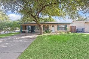 ranch-style house with a front yard