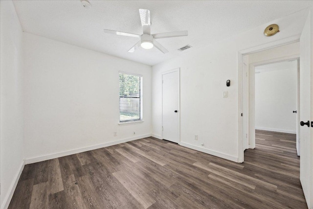 300 Tilbury Ln, Austin, TX 78745 - unfurnished bedroom featuring wood finished floors and ceiling fan