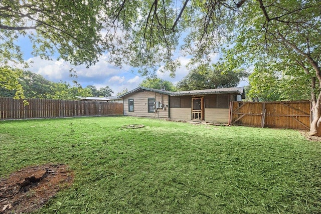 300 Tilbury Ln, Austin, TX 78745 - fenced backyard featuring a sunroom
