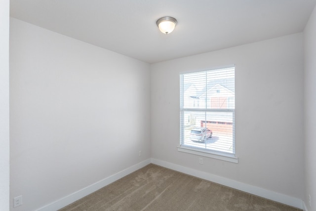 view of carpeted spare room